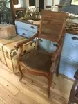 Fauteuil de coiffeur canné début 20e