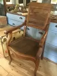 Fauteuil de coiffeur canné début 20e