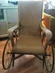 Fauteuil de repos rotin roues fer forgé 