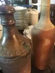 Lot de trois bouteilles 19e en terre cuite et grè 