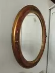 Miroir ovale doré