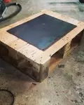 Table basse palette et plaque acier