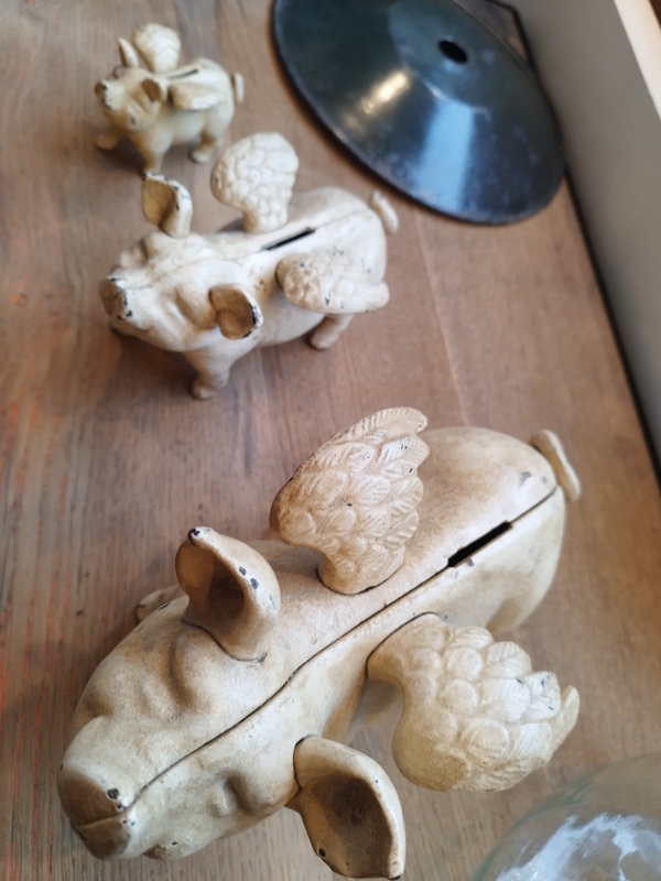 Tirelires cochon en fonte